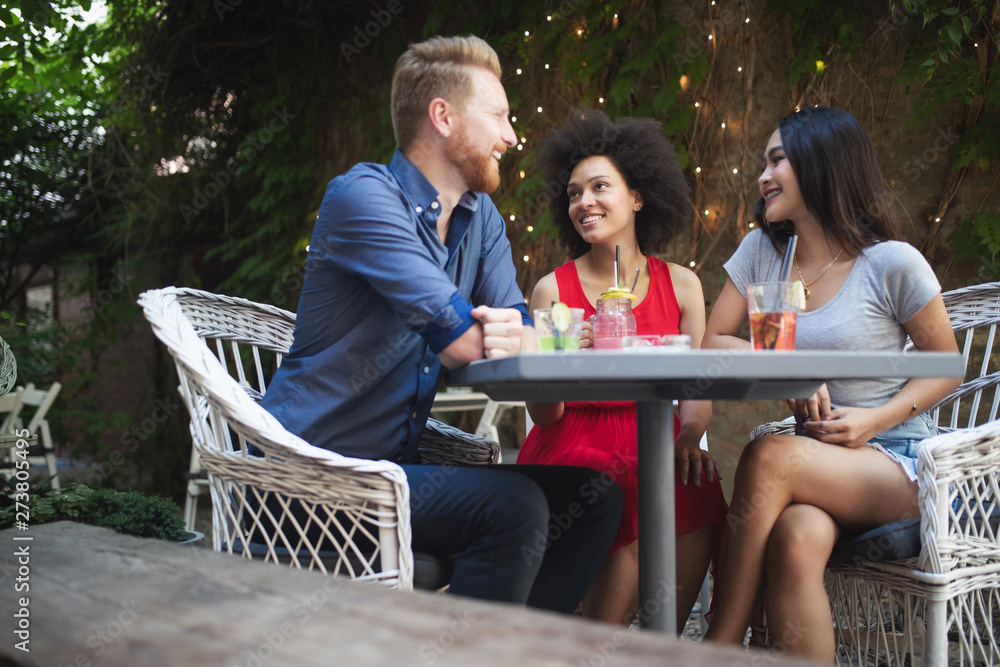 Group of friends having fun together. People talking laughing and enjoying their time Group of friends having fun together. People talking laughing and enjoying their time