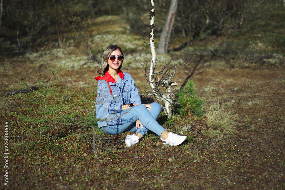 Girl sitting in the forest Girl sitting in the forest