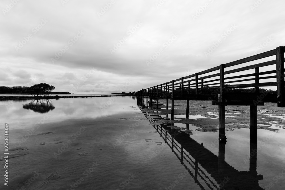 Obraz premium Landscape of Urunga lagoon with boardwalk. It is a famous holiday destination in New South Wales, Australia.