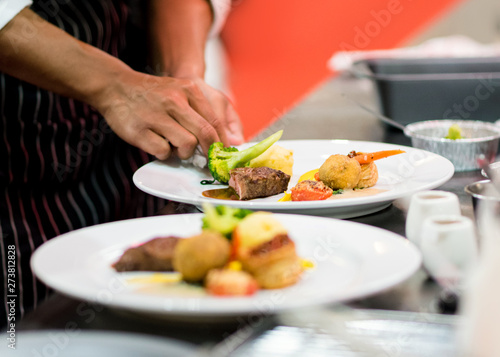 Wallpaper Mural Chef preparing food in the kitchen, chef cooking, Chef decorating dish Torontodigital.ca