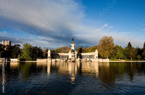 Monument in El Retiro Park reflected in water, Madrid, Spain
