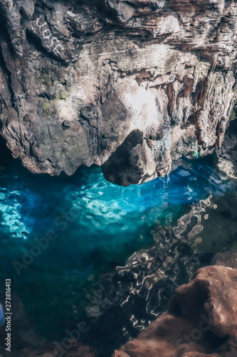 Cave lake in the tropical blue sea
