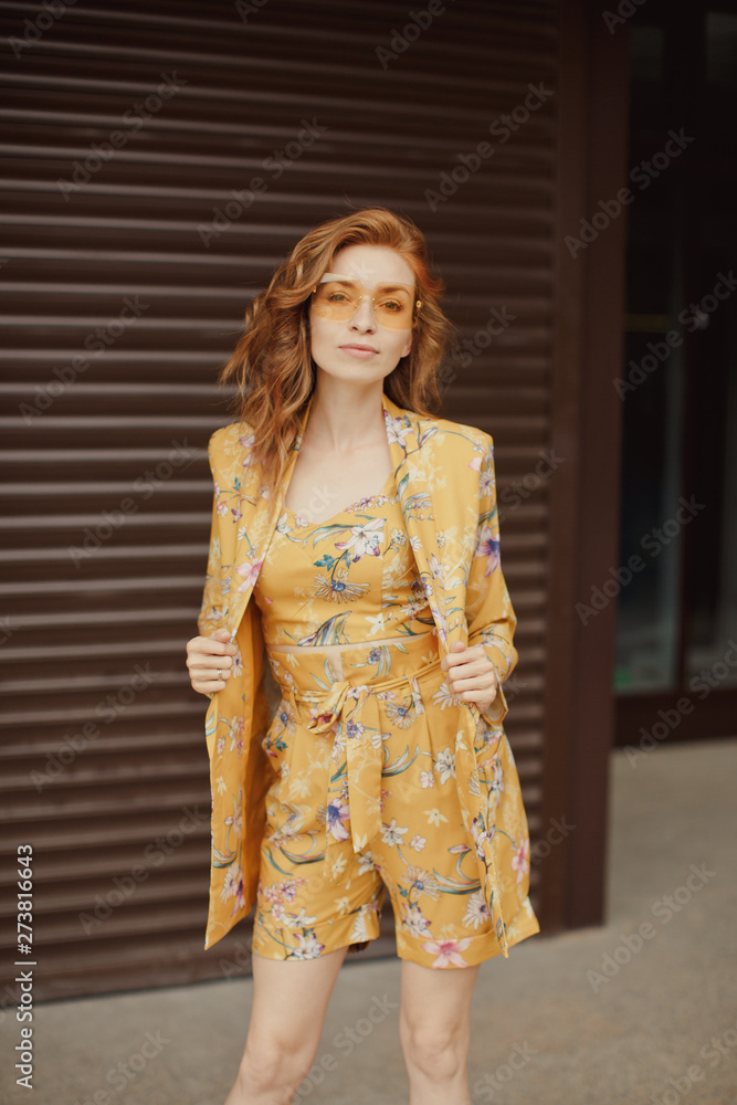 Fototapeta premium Woman in yellow