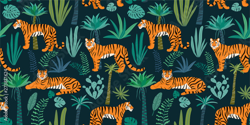Tiger pattern with tropical leaves. Vector seamless texture.