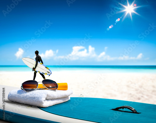 Surfer board of free space for your decoration and summer time. Sunny warm day and ocean landscape.  © magdal3na