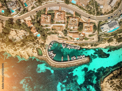 Beautiful birdeye view on the sea coastline with pier and yakhts photo