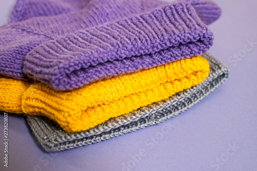 Woolen autumn and winter clothing: sweaters and hat.