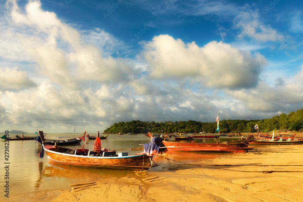 Long-tail fishboats on Rawai beach at Phuket Thailand