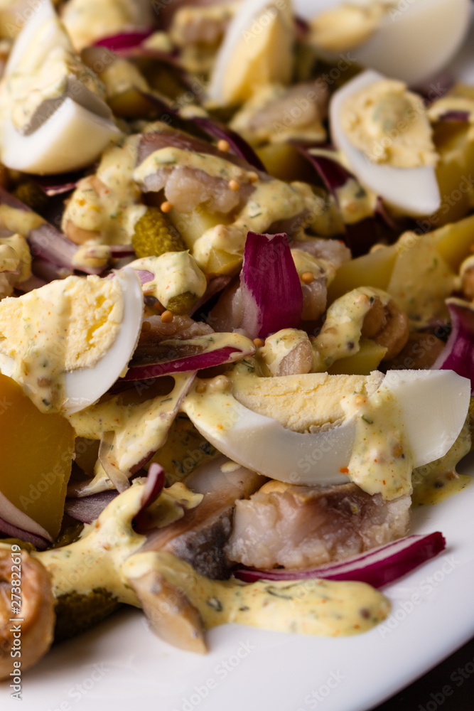 Salad with eggs onion potatoes and sause Salad with eggs onion potatoes and sause