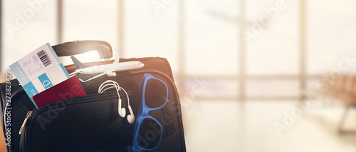 traveling luggage on airport terminal background with copy space