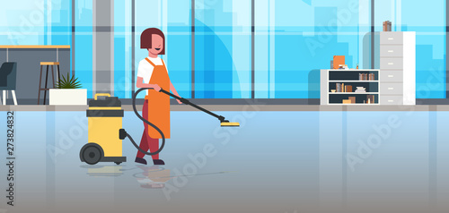 woman holding professional vacuum cleaner female cleaner janitor in uniform cleaning service floor care concept modern co-working office interior horizontal flat full length