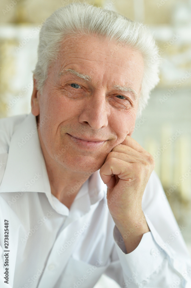 Portrait of beautiful smiling senior man posing Portrait of beautiful smiling senior man posing