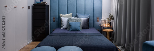 Blue bedroom with double bed