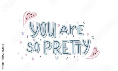 Horizontal card with hand drawn lettering You are so pretty with doodle heart and flowers decoration. Cute compliment for print on t-shirt and cup. Inspirational quote for love expression