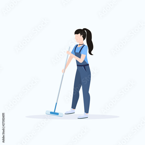 female janitor in uniform mopping floor woman cleaner holding mop cleaning service concept full length flat white background