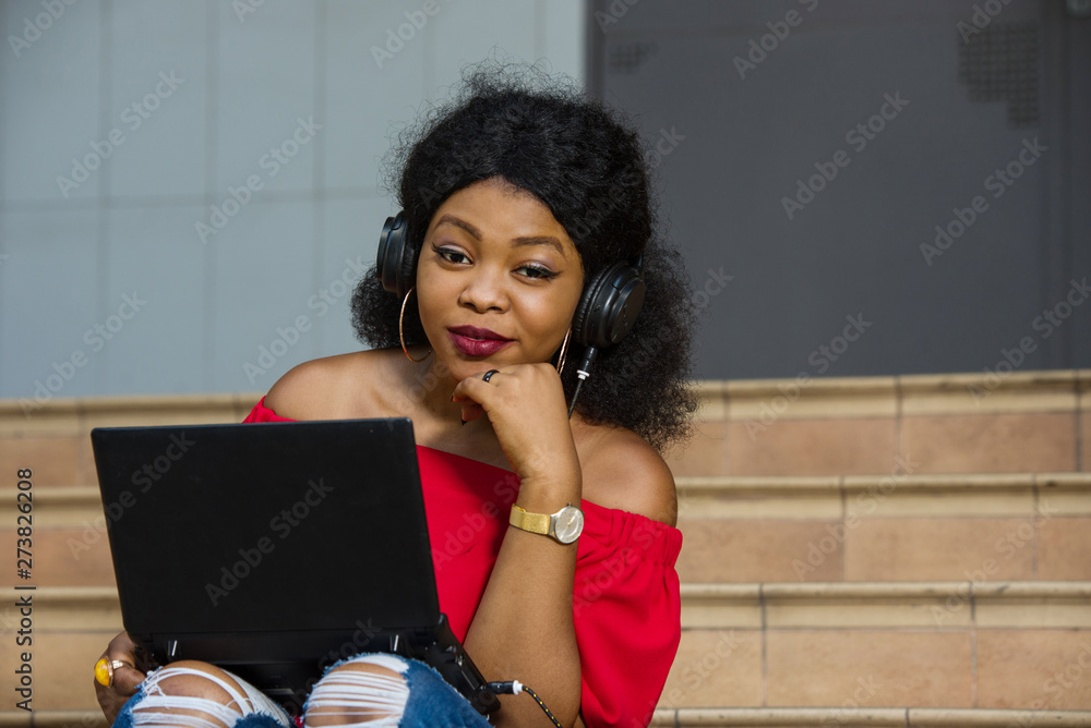 portrait of young girl with laptop, smiling. portrait of young girl with laptop, smiling.