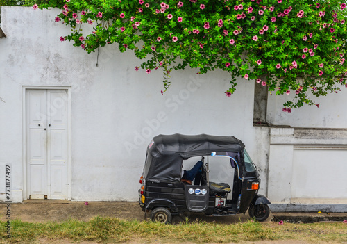 Tuk tuk taxi on street in Galle, Sri Lanka photo