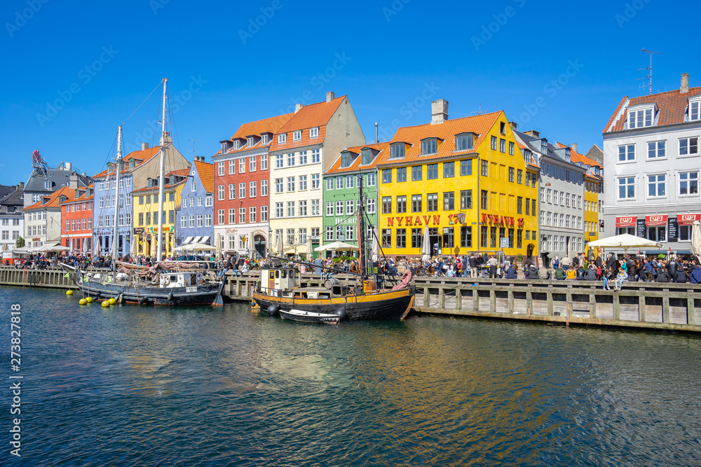 View of Nyhavn pier with color buildings in Copenhagen city, Denamrk