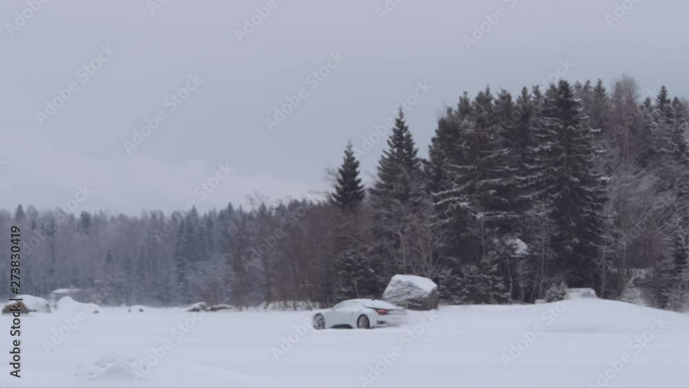 BMW i8 Supercar drifting on frozen sea in Vaasa (Finland). Shot in slow-motion with Red Monster 8K. In 4K BMW i8 Supercar drifting on frozen sea in Vaasa (Finland). Shot in slow-motion with Red Monster 8K. In 4K