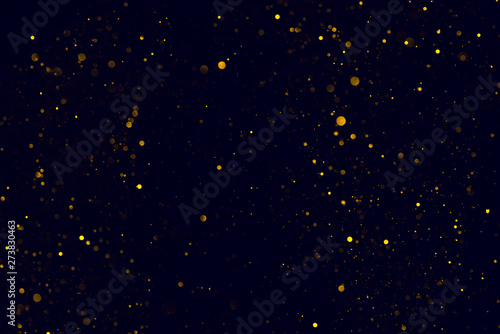 Glitter lights golden dust falling bokeh background