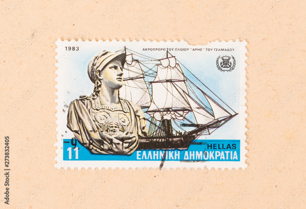 GREECE - CIRCA 1983: A stamp printed in Greece shows a statue and a boat, circa 1983