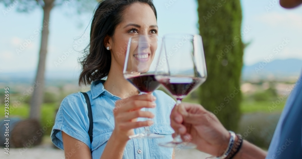 Romantic couple, woman toasting and smiling with red wine at sunset warm light. Friends italian trip in Umbria.4k slow motion Romantic couple, woman toasting and smiling with red wine at sunset warm light. Friends italian trip in Umbria.4k slow motion