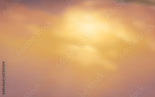 Editable vector illustration of high misty clouds in a blue and orange sky made with a gradient mesh