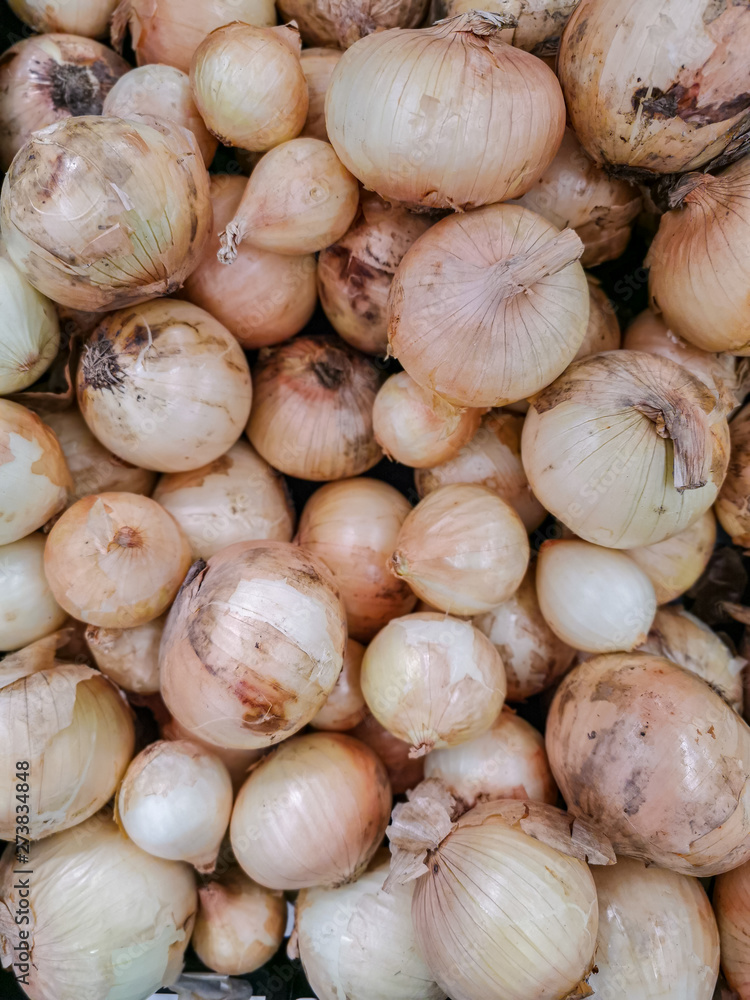 Top view of Fresh onions. Onions in market Top view of Fresh onions. Onions in market