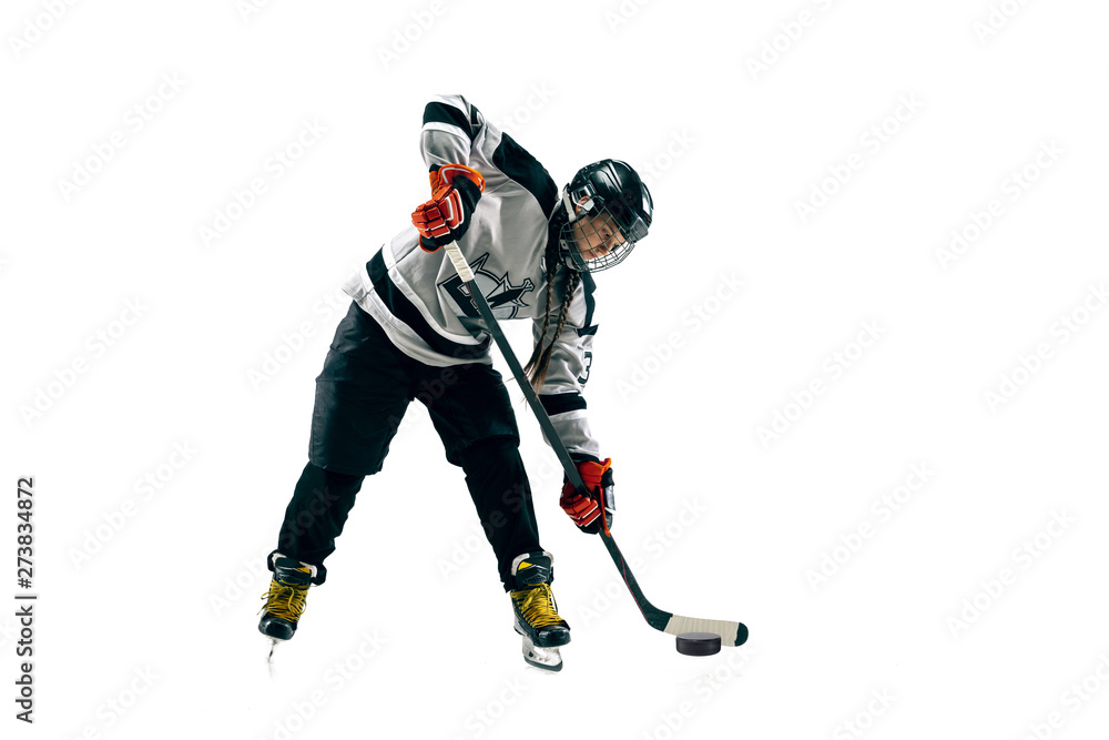 Young female hockey player with the stick isolated on white background. Sportswoman in action wearing equipment attacking for the goal or score. Concept of sport, healthy lifestyle, motion, movement. Young female hockey player with the stick isolated on white background. Sportswoman in action wearing equipment attacking for the goal or score. Concept of sport, healthy lifestyle, motion, movement.