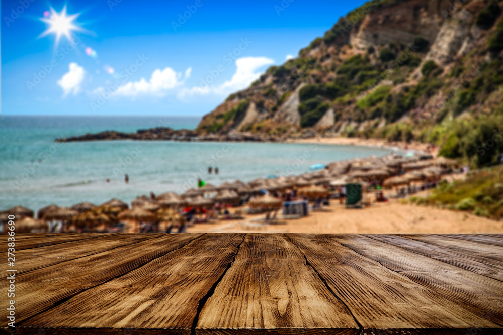 Desk of free space and beach summer background 