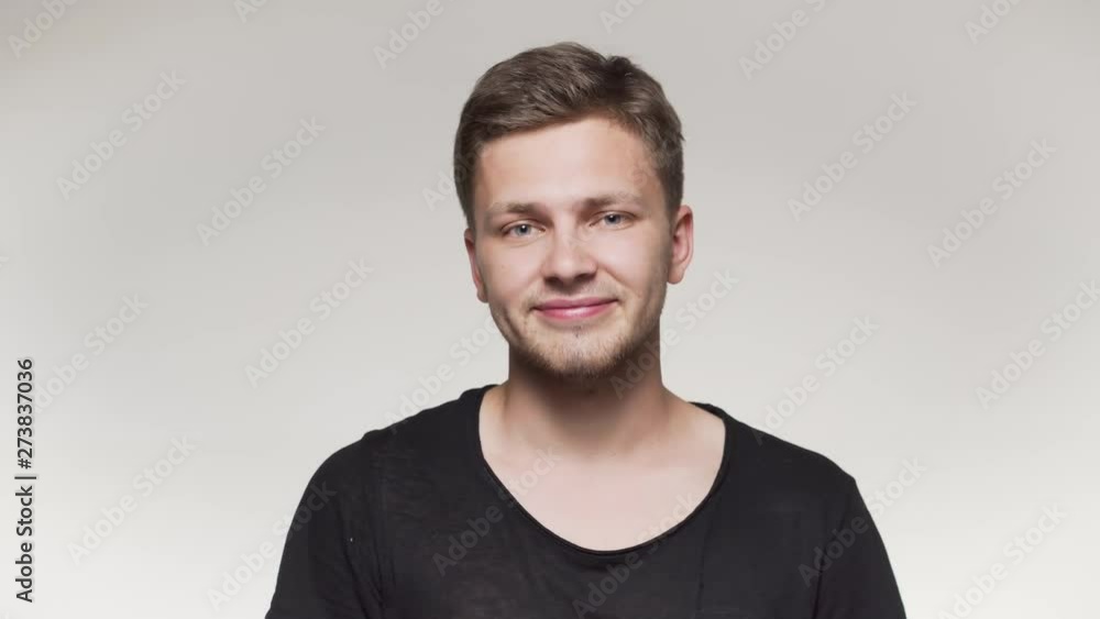 Male with tanned skin showing like. Close up portrait. Isolated Male with tanned skin showing like. Close up portrait. Isolated
