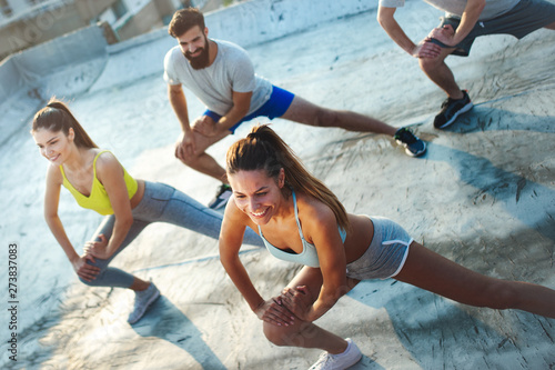 Group of happy fit young pe...