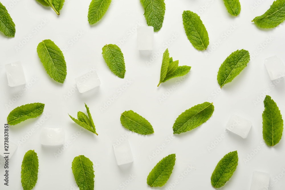 Ice cubes with mint leaves flat lay, isolated on white. Ice cubes with mint leaves flat lay, isolated on white.