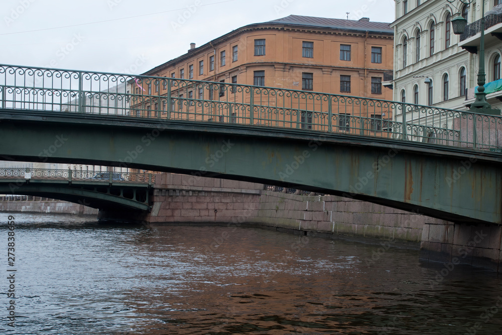 St Petersburg Russia,  pedestrian footbridge over canal on an overcast day