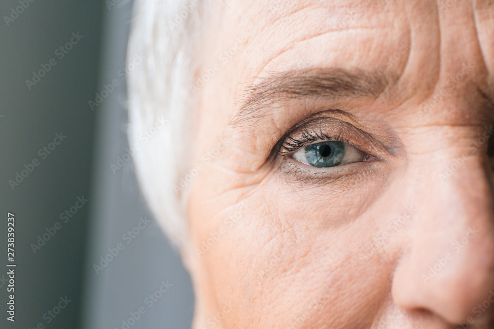 Face of elderly woman, closeup - obrazy, fototapety, plakaty 