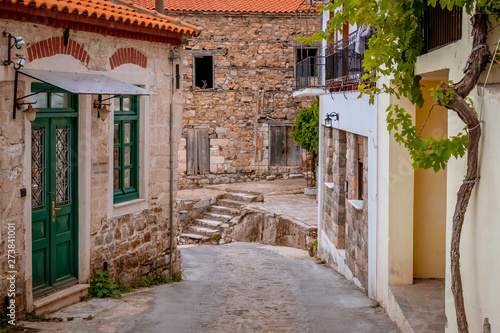 Fototapeta Naklejka Na Ścianę i Meble -  A narrow street somewhere in Chora, on the Greek island Samothraki