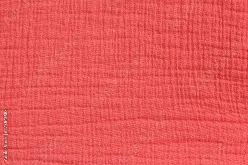 Obraz na płótnie Cotton muslin background in rich coral color