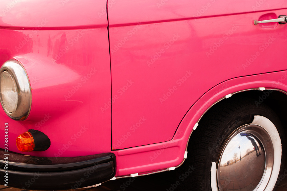 Retro pink car close up.