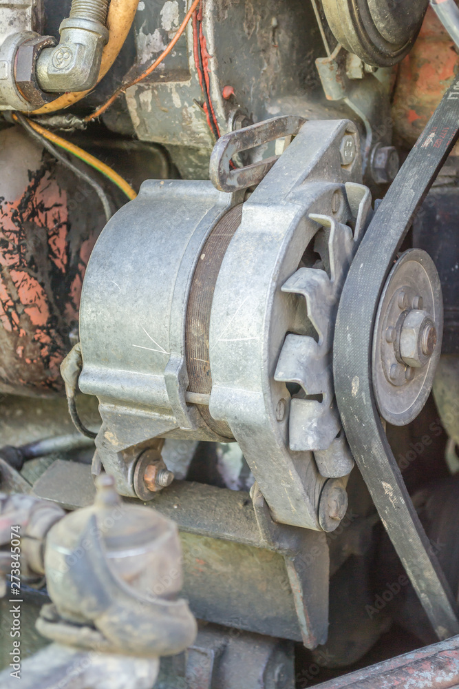 Sremski Karlovci, Serbia - June 12. 2019: Engine of old tractor parked in the street Sremski Karlovci, Serbia - June 12. 2019: Engine of old tractor parked in the street