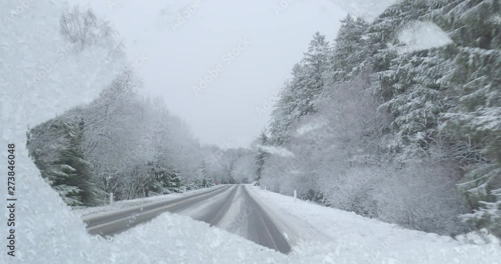 Dangerous Winter Driving - looking through a insufficiently de-iced windshield - hand held camera - ProRes Dangerous Winter Driving - looking through a insufficiently de-iced windshield - hand held camera - ProRes