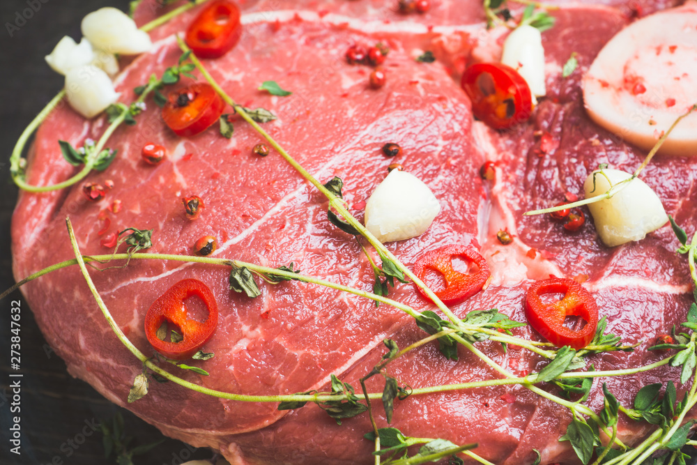 Raw fresh meat on the rustic background. Selective focus. Shallow depth of field. Raw fresh meat on the rustic background. Selective focus. Shallow depth of field.