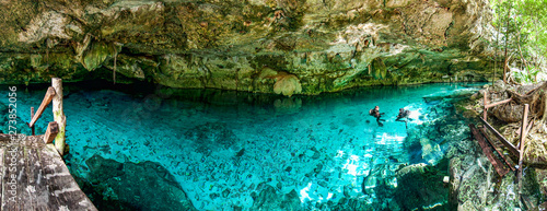 Cenote Dos Ojos - Cave Two Eyes - in Mexico, peninsula Yucatan with sparkling clear turquoise water and warm water