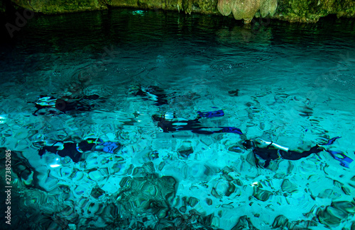 Cenote Dos Ojos - Cave Two Eyes - in Mexico, peninsula Yucatan with sparkling clear turquoise water and warm water