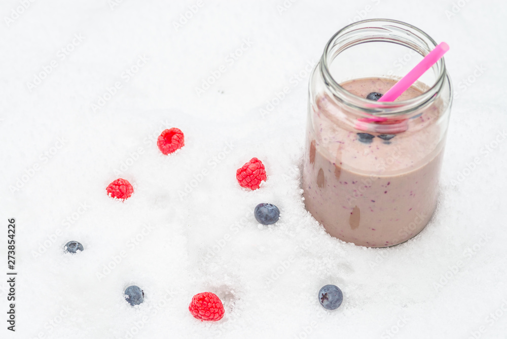 Fresh Smoothie beverage made from pureed berry raw fruit. Cold ice cream with frozen yogurt for your healthfulness.