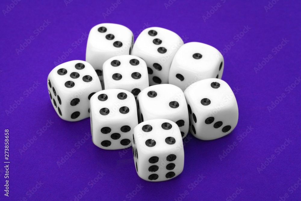 White dices against a blue background White dices against a blue background
