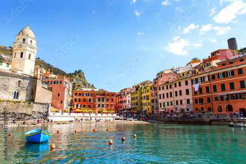 Liguria, Italy coastline of Riviera with colorful houses on sunny warm day. Monterosso al Mare, Vernazza, Corniglia, Manarola and Riomaggiore, Cinque Terre National Park UNESCO World Heritage