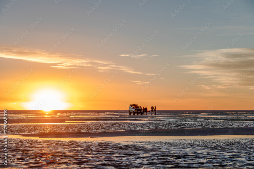 Sunset at Uyuni Salt Flats in Bolivia, the incredible salt desert in South America Sunset at Uyuni Salt Flats in Bolivia, the incredible salt desert in South America