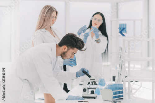 group of young scientist experimenting in the laboratory