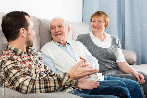 Parents and son enjoying evening © JackF