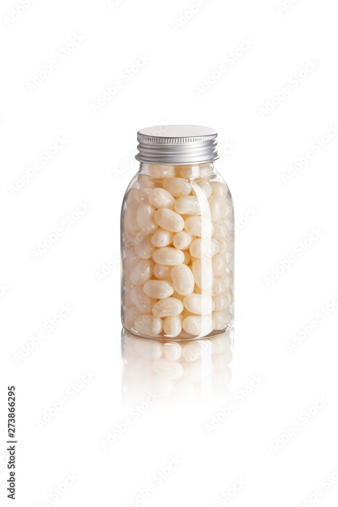 White Candy Beans packaged in a glossy and transparent container on a white background White Candy Beans packaged in a glossy and transparent container on a white background